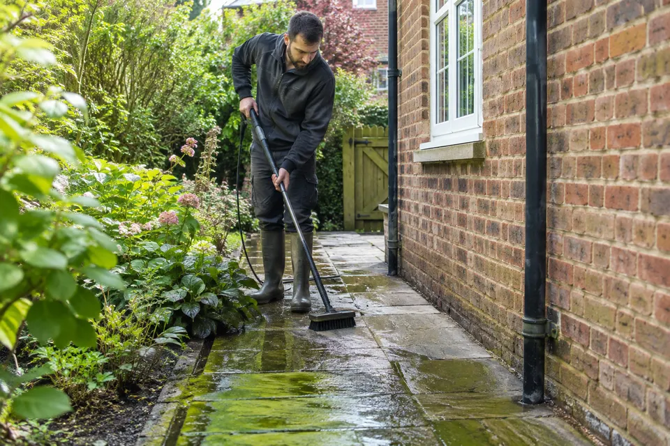 Cleaning on a shaded garden path